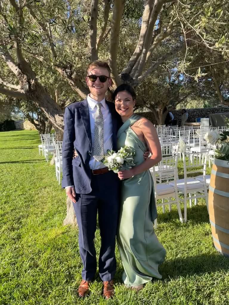 Luisa and Tom by an olive tree